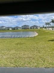 9509 Southwest Libertas Way, Unit : Port St. Lucie, FL 34987 - Photo 16 of 16 a view of an ocean