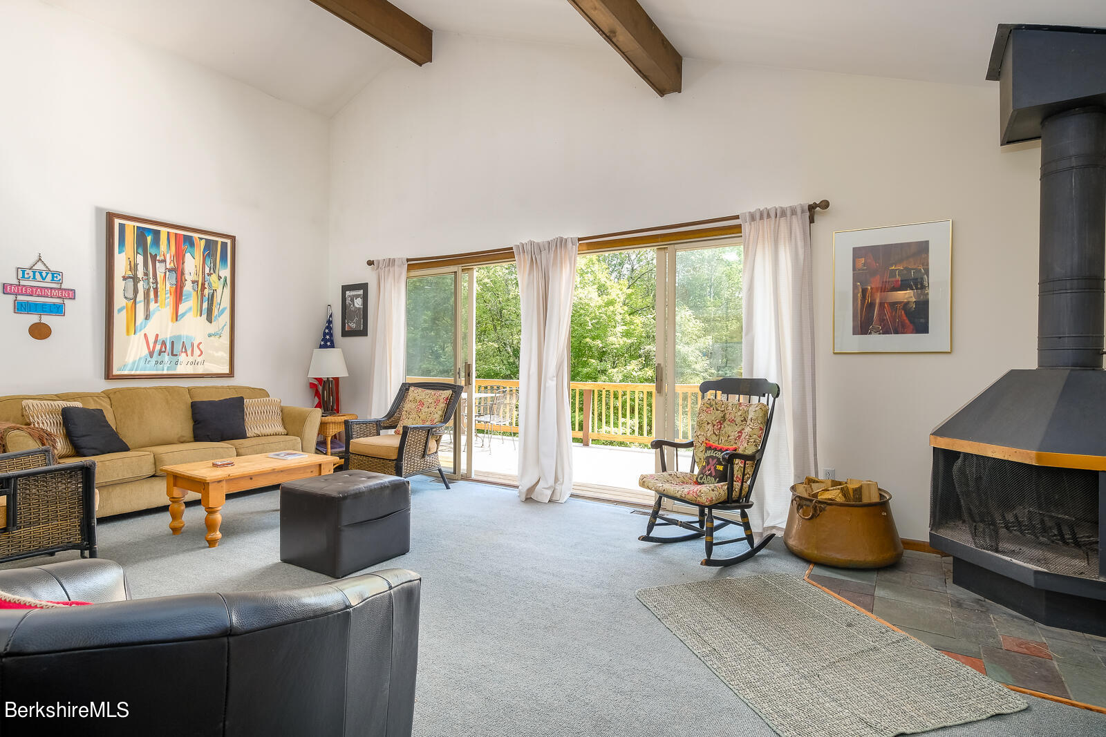 3023 Hancock Road Hancock, MA 01267 - Photo 12 of 23 a living room with furniture a window and a fireplace