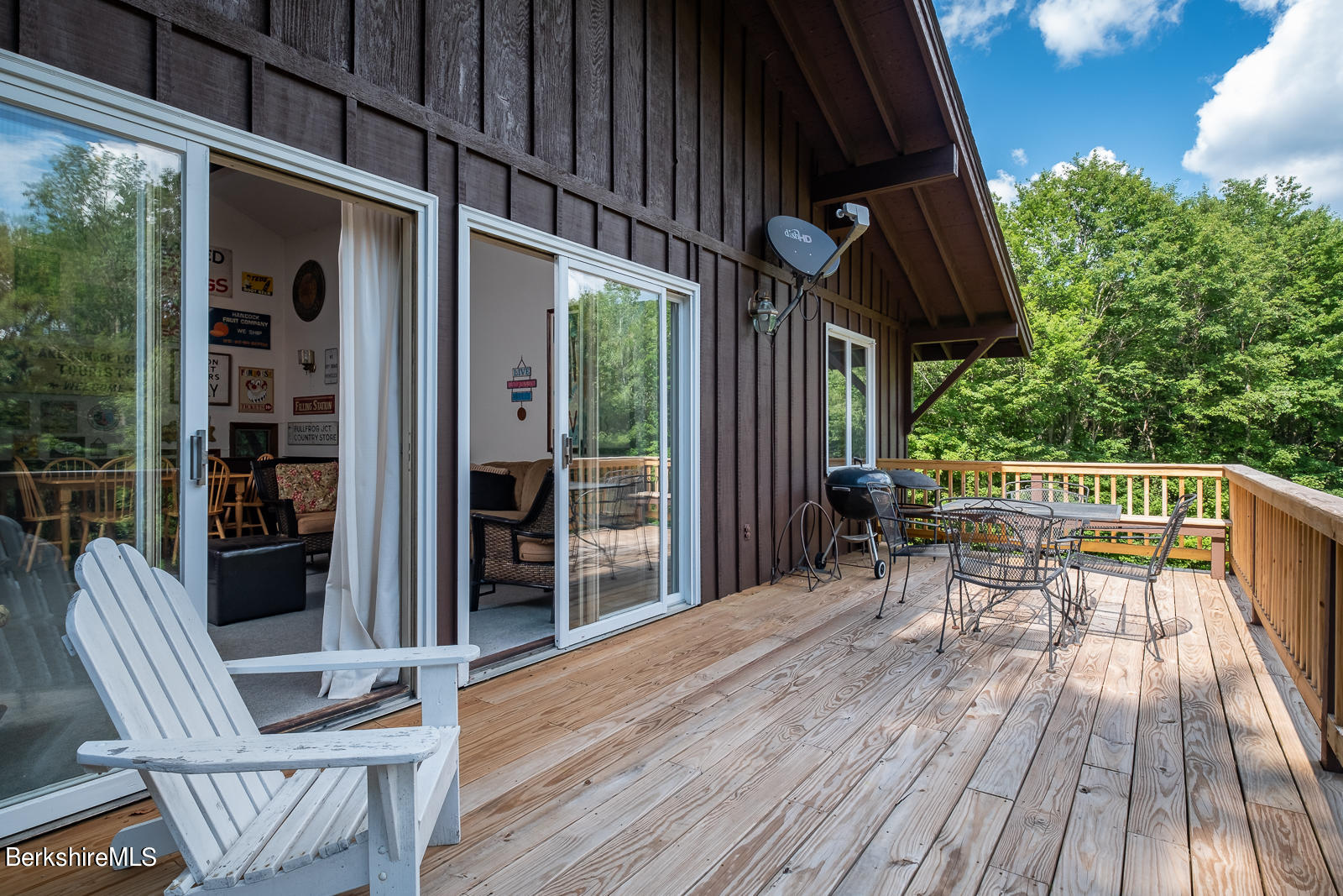 3023 Hancock Road Hancock, MA 01267 - Photo 7 of 23 a view of balcony with chairs and wooden floor