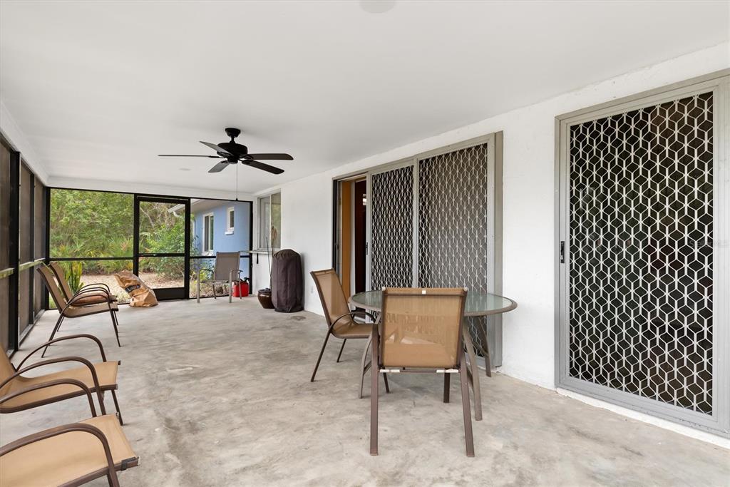 23226 Midway Boulevard Punta Gorda, FL 33980 - Photo 22 of 37 a view of a livingroom with furniture and window