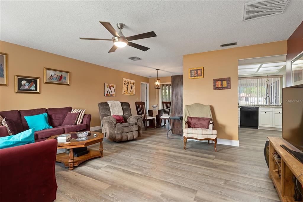 23226 Midway Boulevard Punta Gorda, FL 33980 - Photo 3 of 37 a living room with furniture