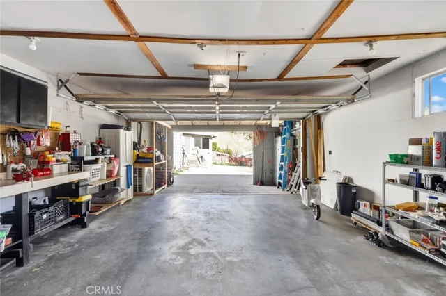 a swimming pool with a outdoor seating and yard
