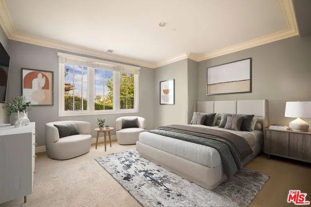 a bedroom with a bed and a couch with window