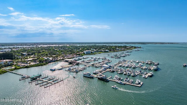 an aerial view of a houses with outdoor space