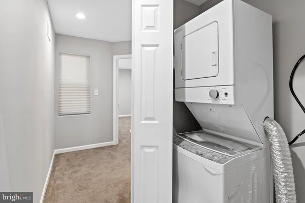 a view of kitchen and utility room