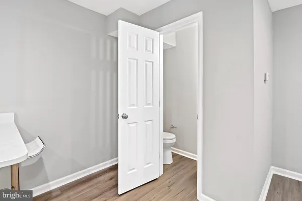 a bathroom with a toilet and a sink