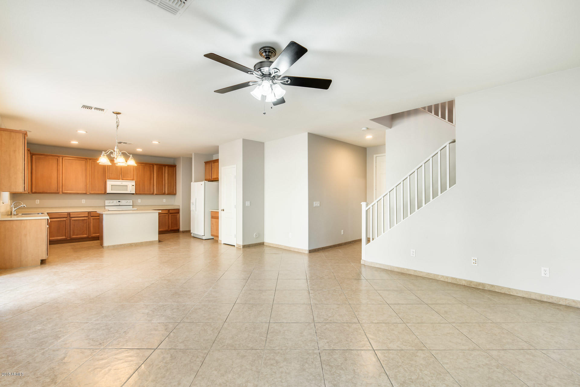 6320 West Beverly Road Laveen, AZ 85339 - Photo 11 of 30 a view of a kitchen with a sink and a window