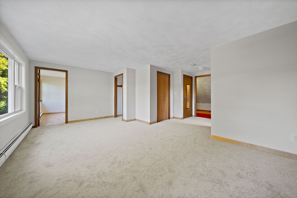 250-252 Mechanic Street Canton, MA 02021 - Photo 20 of 42 an empty room with windows and closet