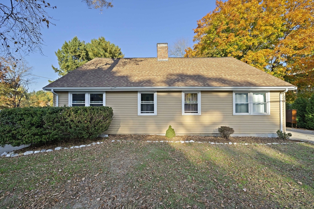 250-252 Mechanic Street Canton, MA 02021 - Photo 2 of 42 a front view of a house with a yard