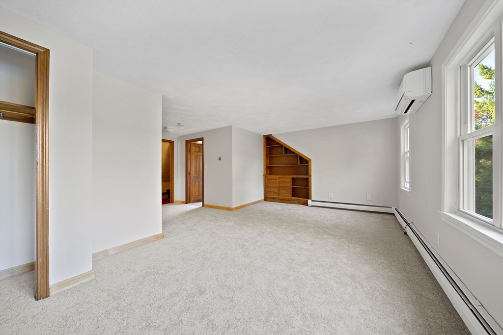 250-252 Mechanic Street Canton, MA 02021 - Photo 21 of 42 an empty room with windows and closet