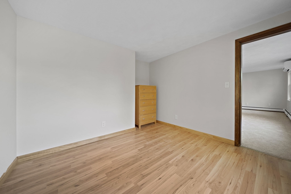 250-252 Mechanic Street Canton, MA 02021 - Photo 23 of 42 a view of an empty room with wooden floor