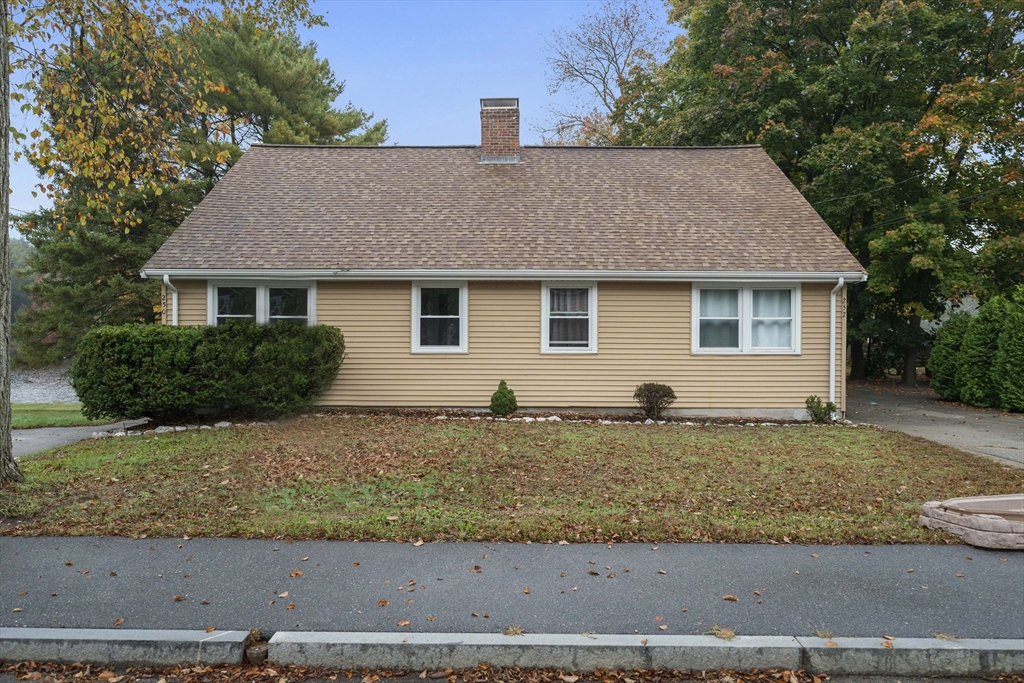 250-252 Mechanic Street Canton, MA 02021 - Photo 29 of 42 a house that has a tree in front of it