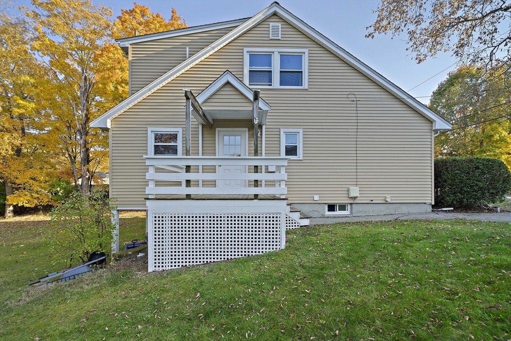 250-252 Mechanic Street Canton, MA 02021 - Photo 3 of 42 a view of a house with a yard
