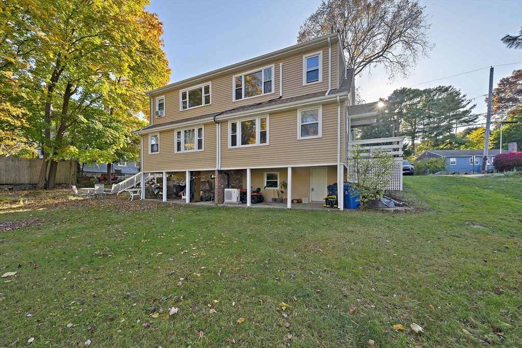250-252 Mechanic Street Canton, MA 02021 - Photo 6 of 42 a view of a house with a yard
