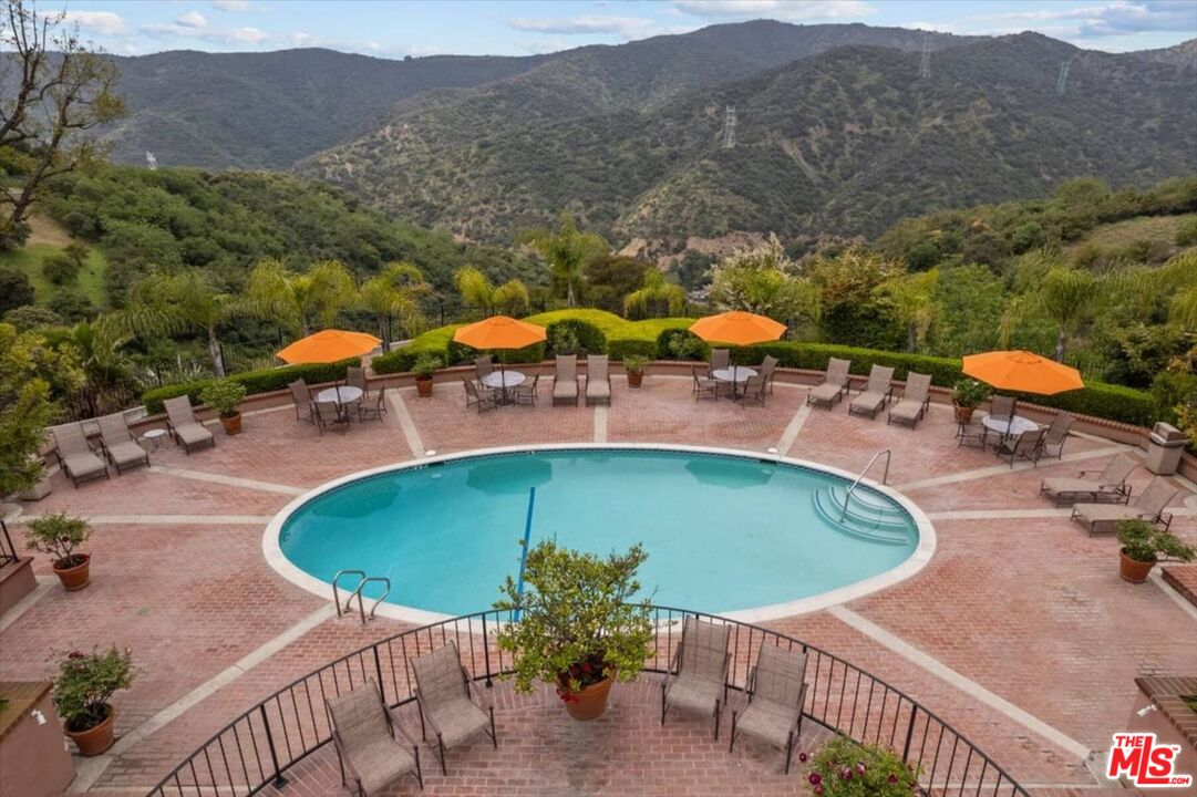 2286 Canyonback Road Los Angeles, CA 90049 - Photo 34 of 40 an outdoor space with furniture and mountain view