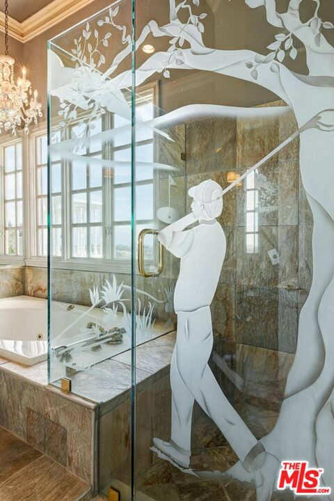 2286 Canyonback Road Los Angeles, CA 90049 - Photo 39 of 40 a bathroom with a bathtub and shower