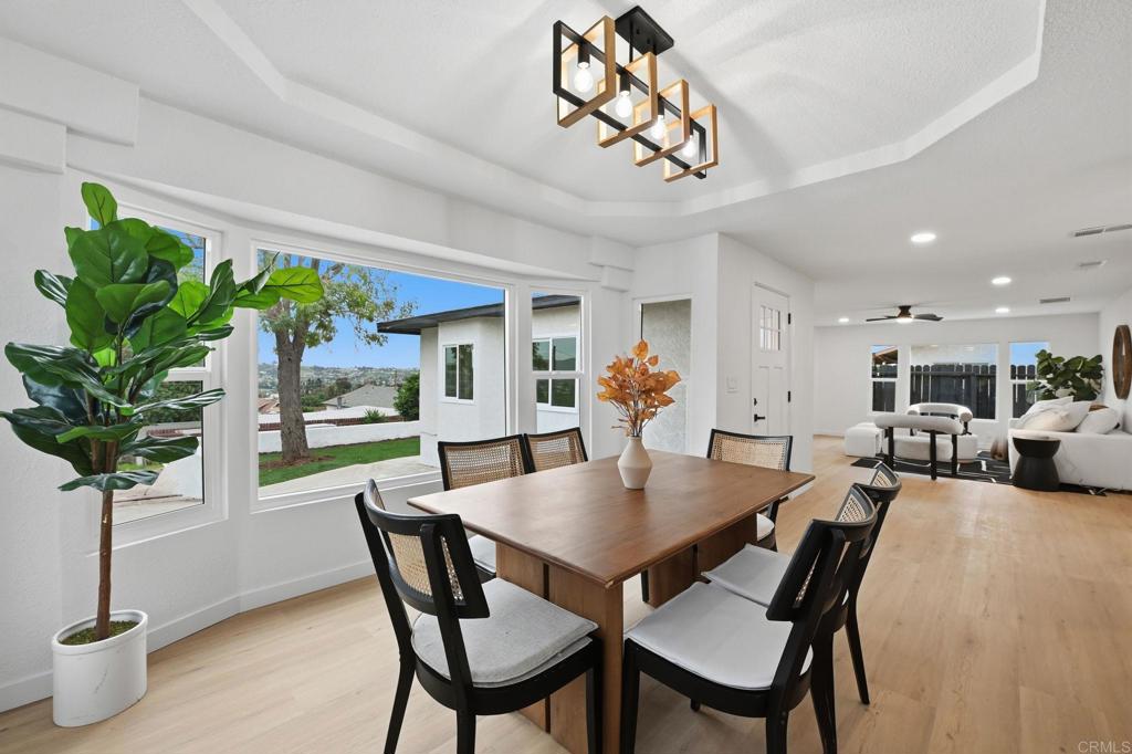 1333 Helix Street Spring Valley, CA 91977 - Photo 11 of 45 a view of a dining room with furniture window and flowerpot