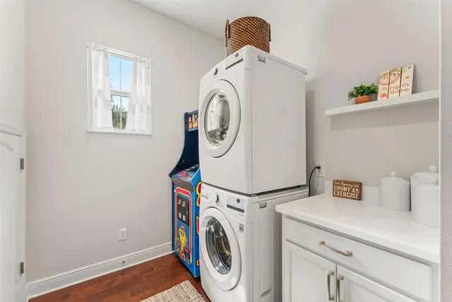 a utility room with dryer and washer