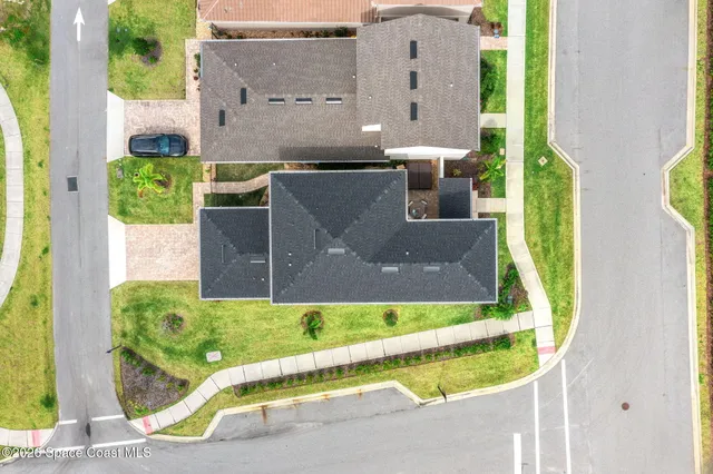 a view of a street with a building in the background