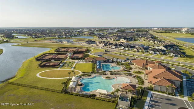 a view of a swimming pool with an ocean view