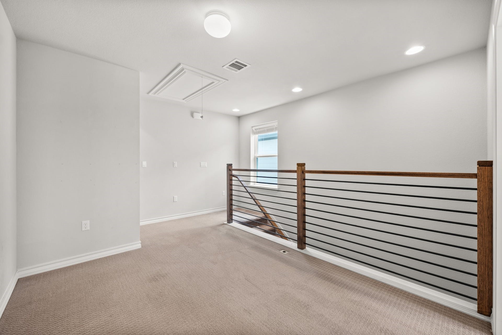 5107 Lemon Tree Path, Unit 127 Austin, TX 78723 - Photo 18 of 40 a view of a livingroom with a staircase