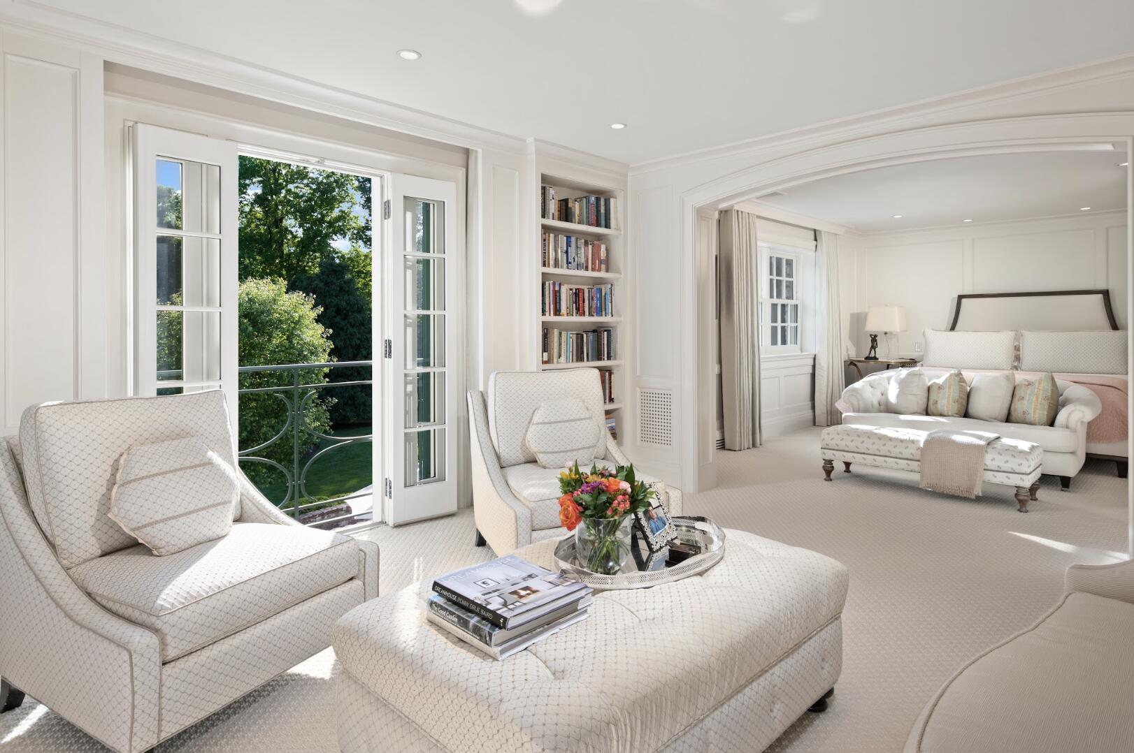 1024 Smith Ridge Road New Canaan, CT 06840 - Photo 21 of 40 a living room with furniture and large windows