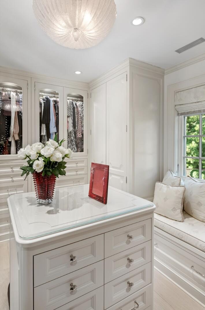 1024 Smith Ridge Road New Canaan, CT 06840 - Photo 23 of 40 a kitchen with a sink and large mirror