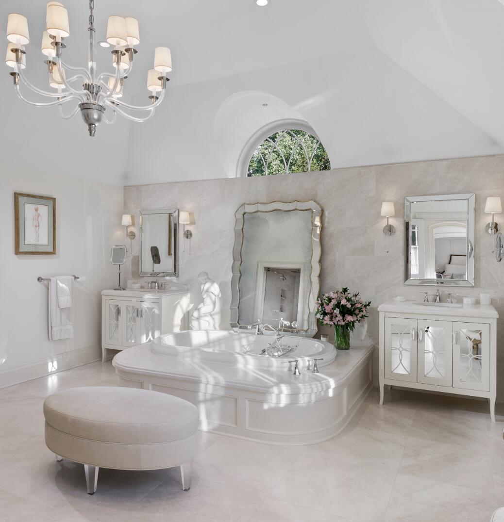 1024 Smith Ridge Road New Canaan, CT 06840 - Photo 24 of 40 a living room with furniture chandelier and a mirror