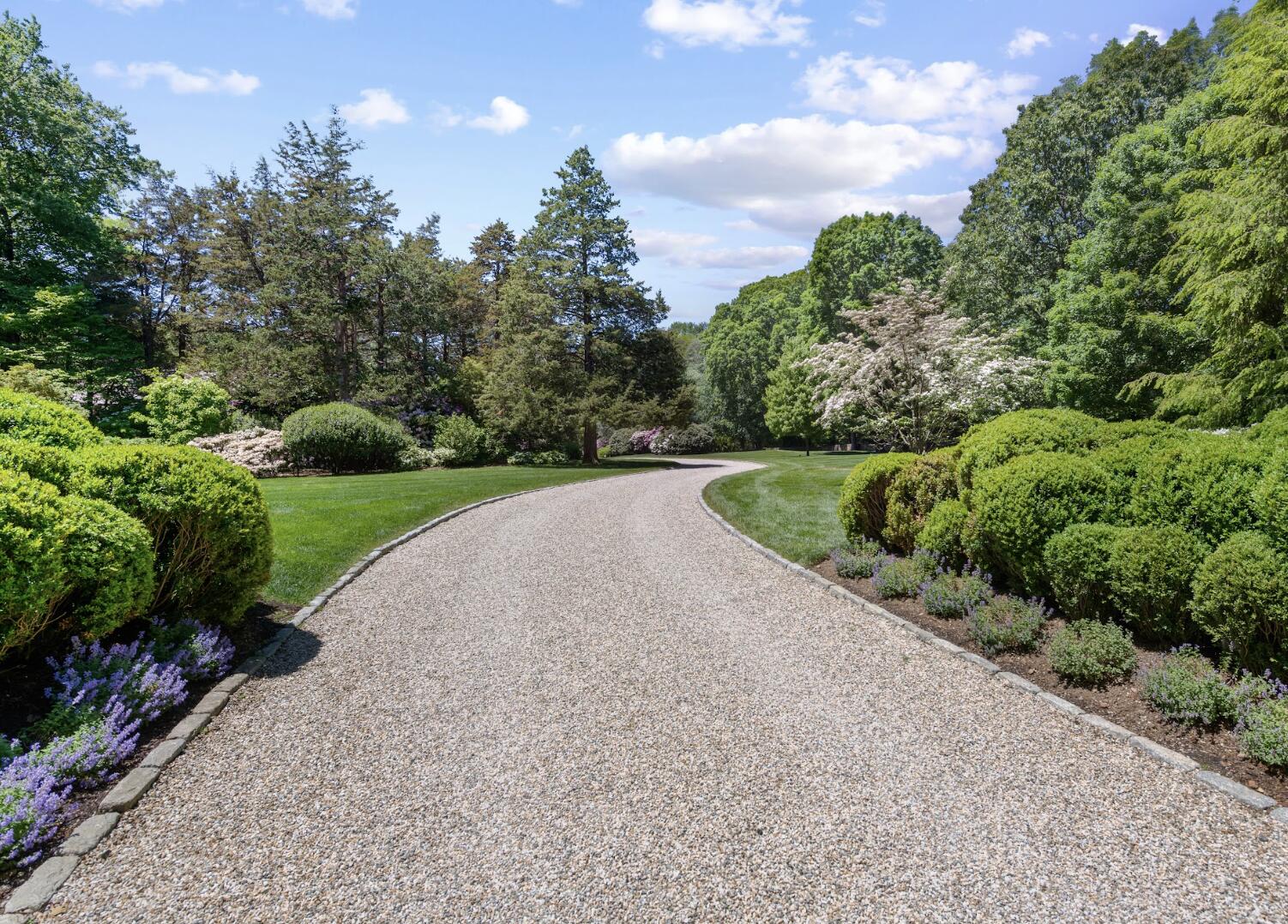 1024 Smith Ridge Road New Canaan, CT 06840 - Photo 4 of 40 a view of a street with a trees