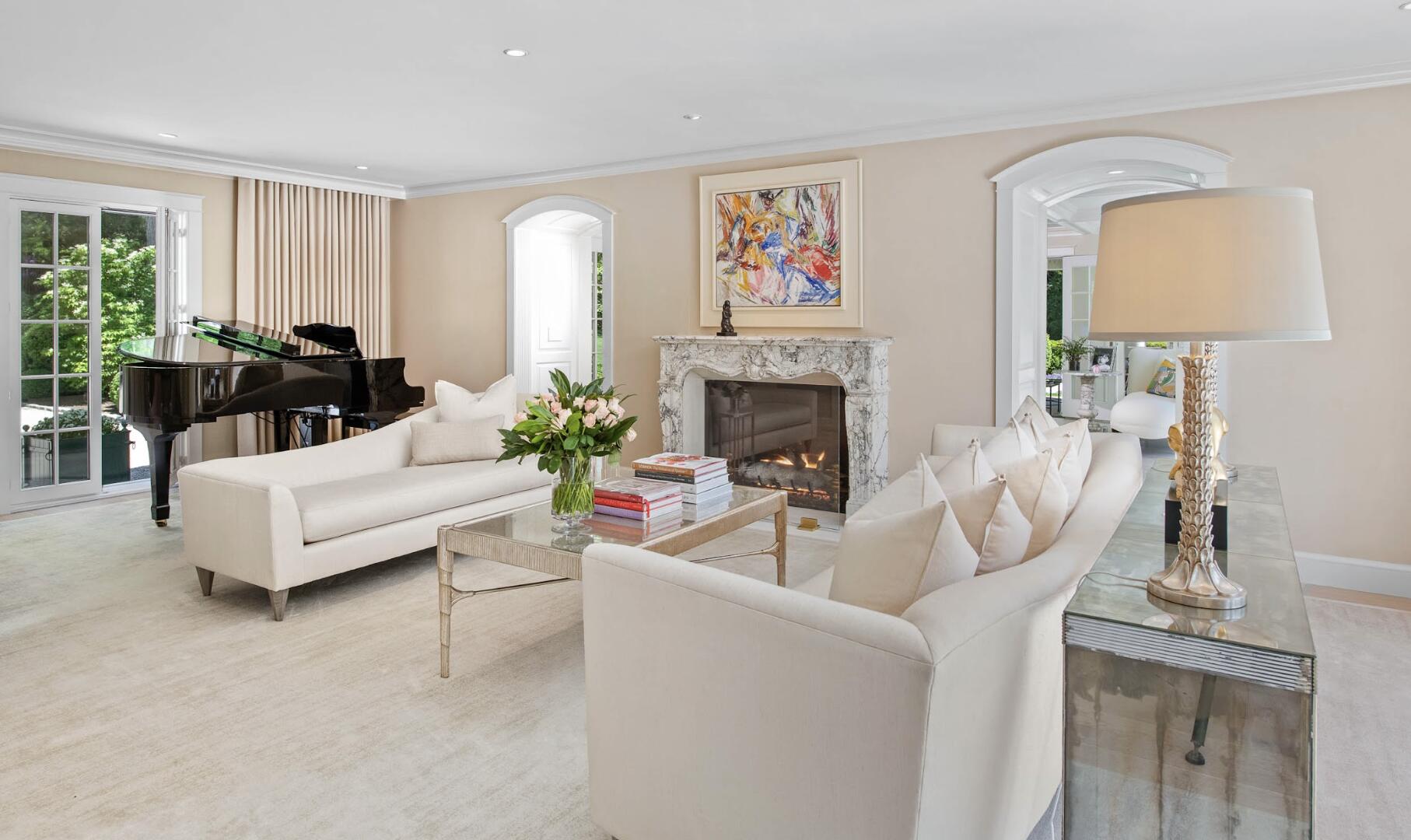 1024 Smith Ridge Road New Canaan, CT 06840 - Photo 7 of 40 a living room with furniture and a fireplace