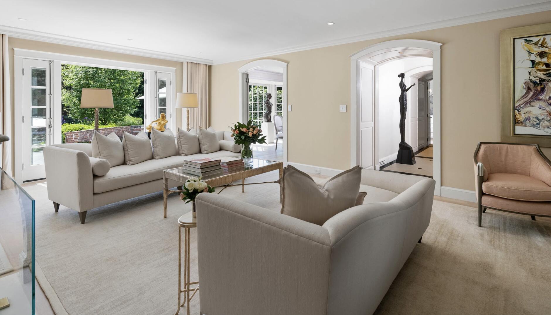 1024 Smith Ridge Road New Canaan, CT 06840 - Photo 8 of 40 a living room with furniture and a large window