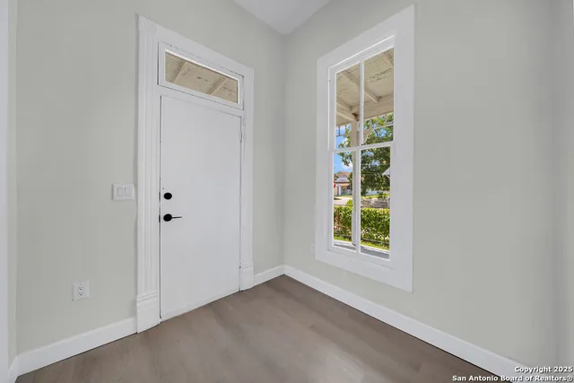 an empty room with windows