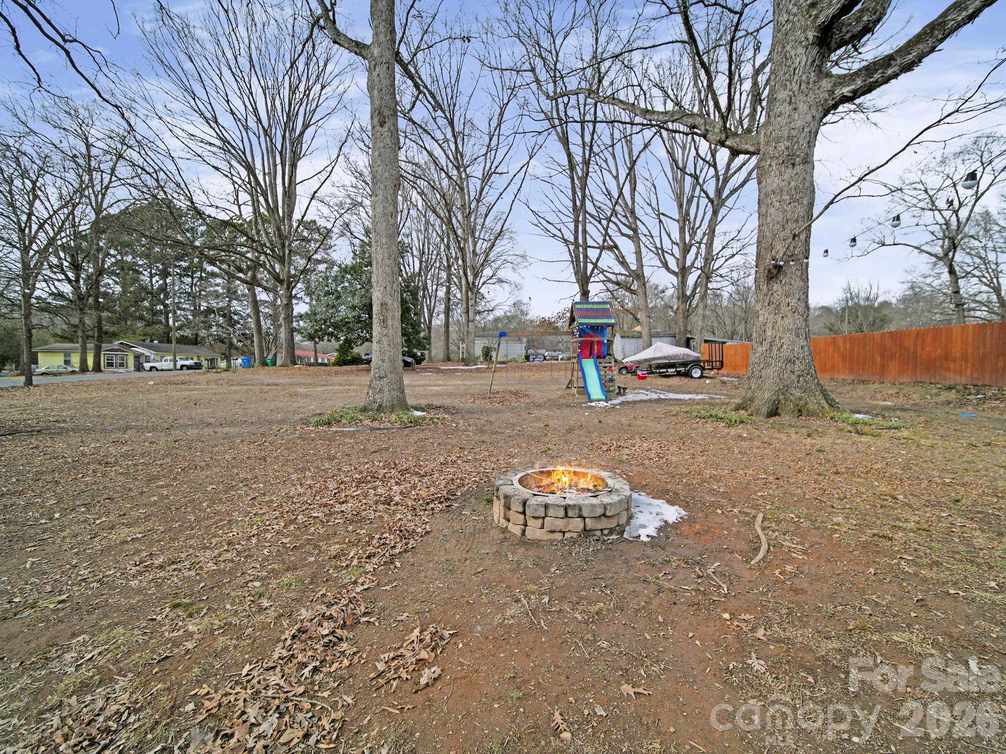 201 North Beverly Drive Locust, NC 28097 - Photo 11 of 36 a view of a road with a yard