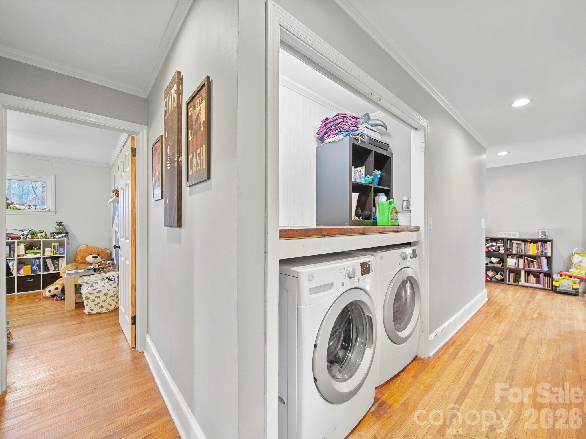 201 North Beverly Drive Locust, NC 28097 - Photo 24 of 36 a view of a hallway with washer and dryer