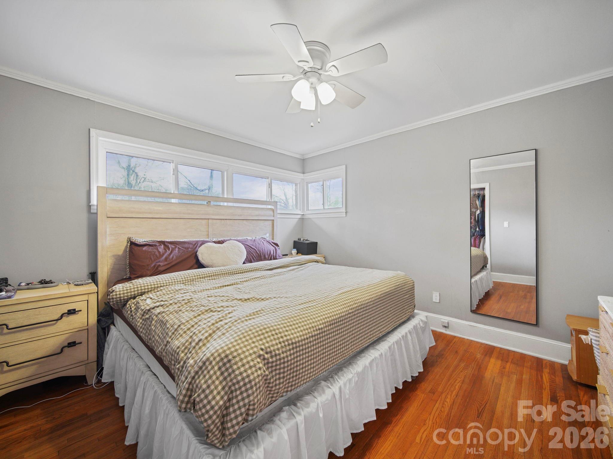 201 North Beverly Drive Locust, NC 28097 - Photo 25 of 36 a bedroom with bed and wooden floor