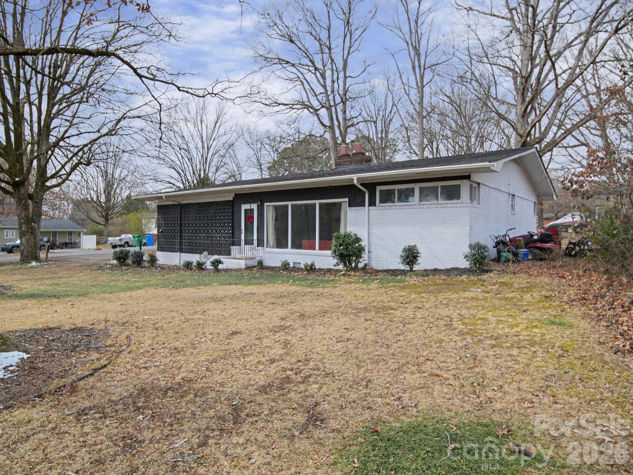 201 North Beverly Drive Locust, NC 28097 - Photo 5 of 36 a front view of a house with garden