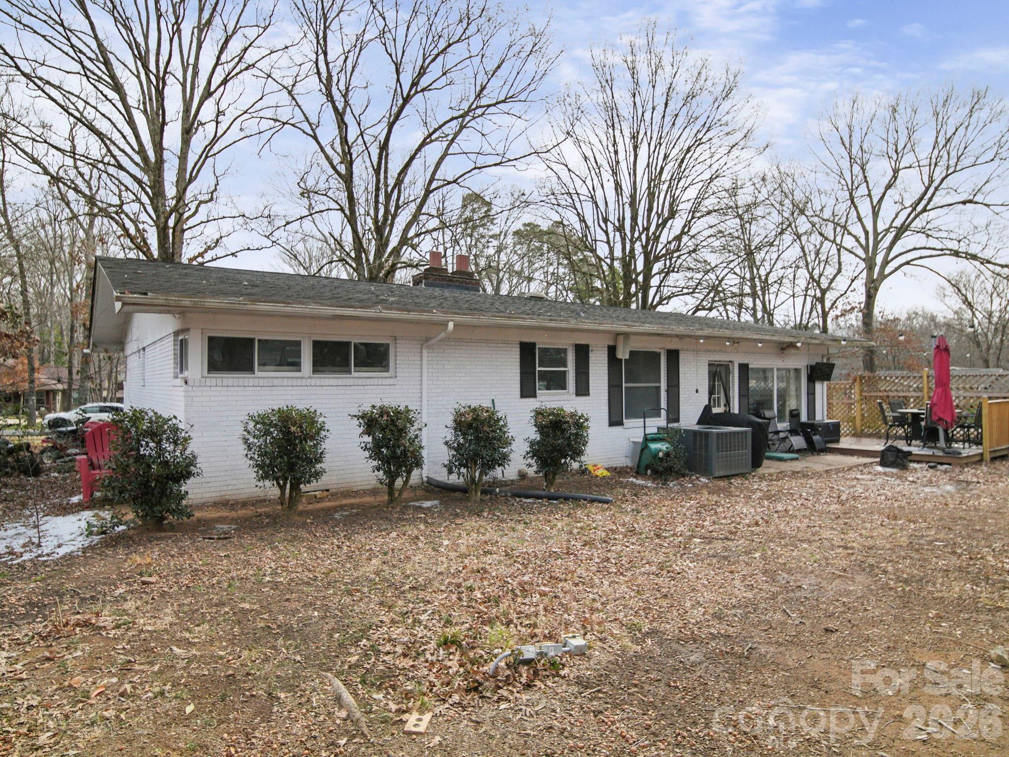 201 North Beverly Drive Locust, NC 28097 - Photo 8 of 36 a front view of house with yard and trees around