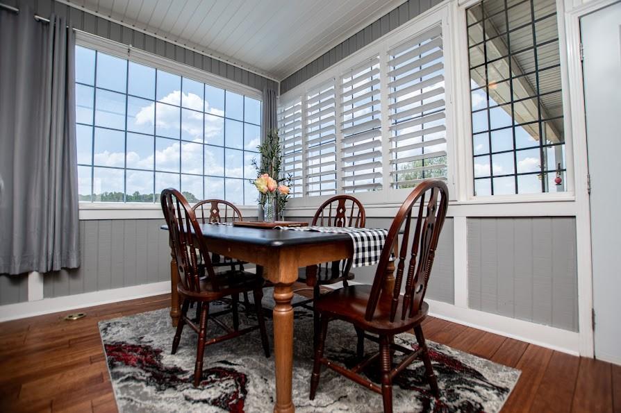 575 Liberty Church Road Carrollton, GA 30116 - Photo 32 of 95 a view of a dining room with furniture and wooden floor