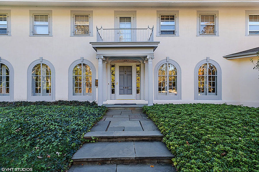 480 Sheridan Road Winnetka, IL 60093 - Photo 2 of 29 a front view of a house with garden