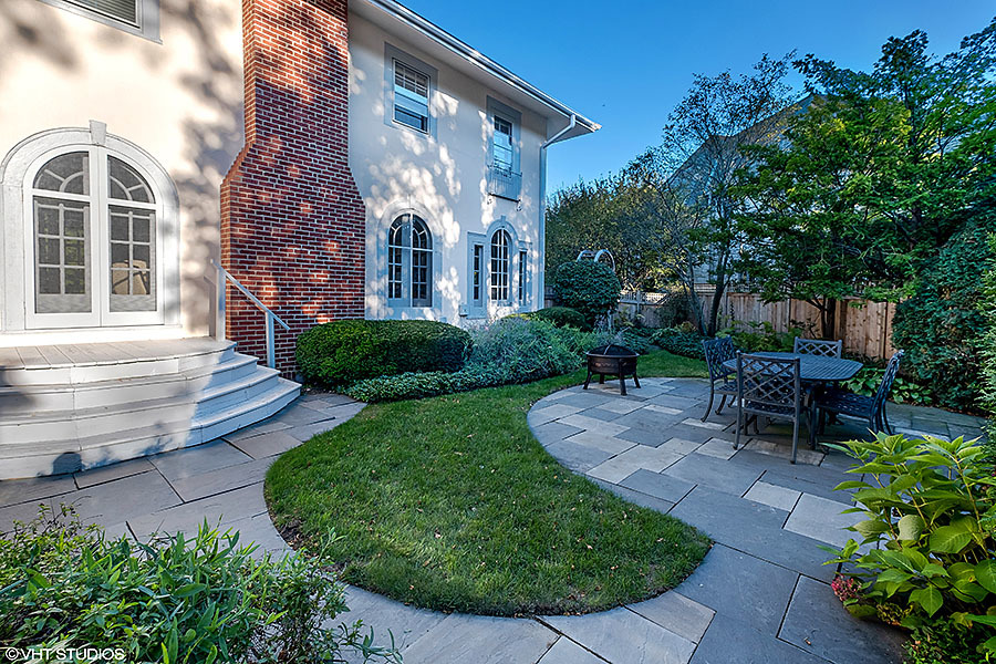 480 Sheridan Road Winnetka, IL 60093 - Photo 25 of 29 a view of a chair and table in backyard of the house