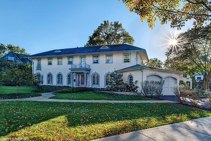 480 Sheridan Road Winnetka, IL 60093 - Photo 29 of 29 a front view of a house with a garden