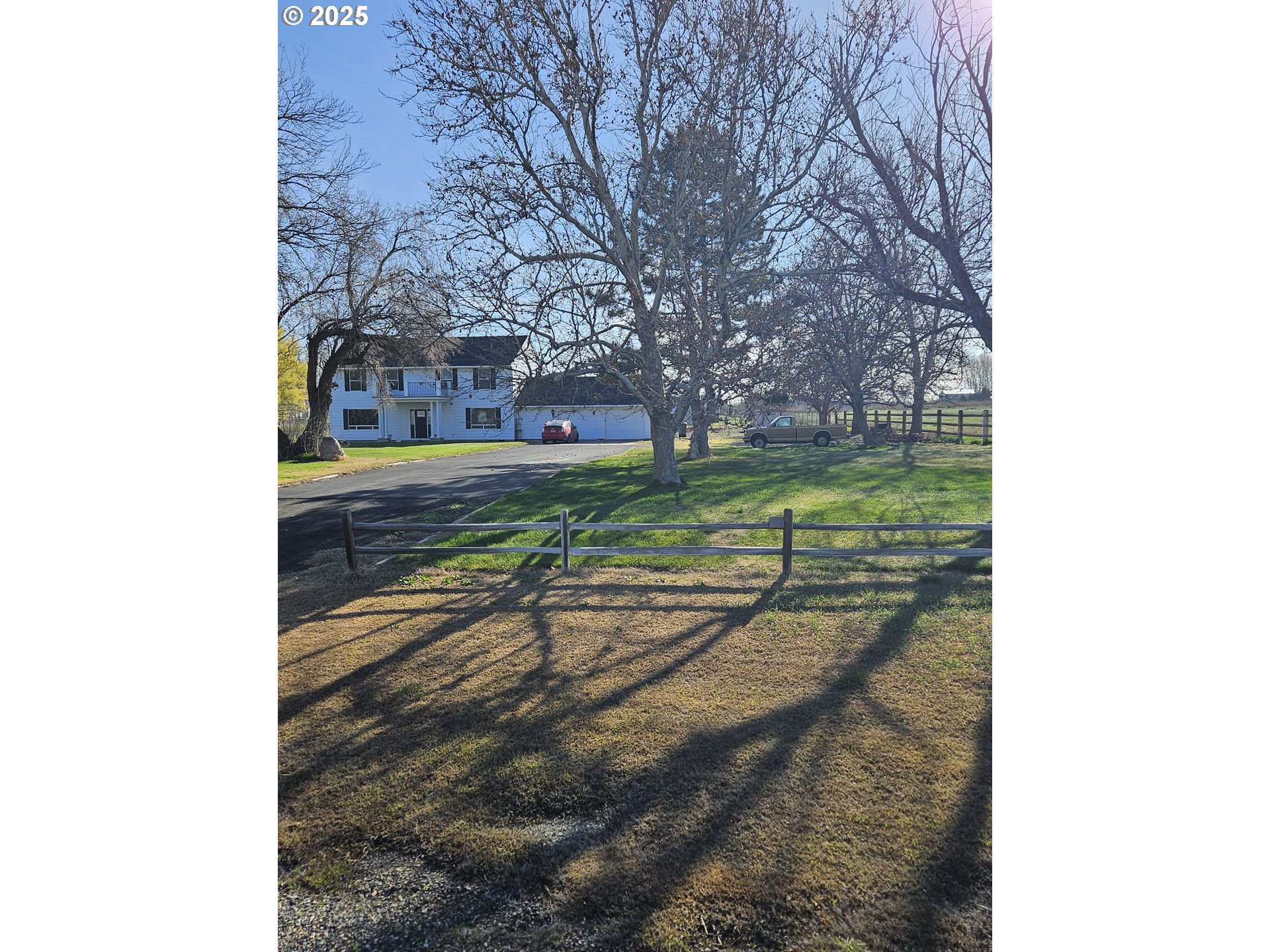 78845 Eastregaard Road Boardman, OR 97818 - Photo 20 of 27 a view of a yard and front view of a building
