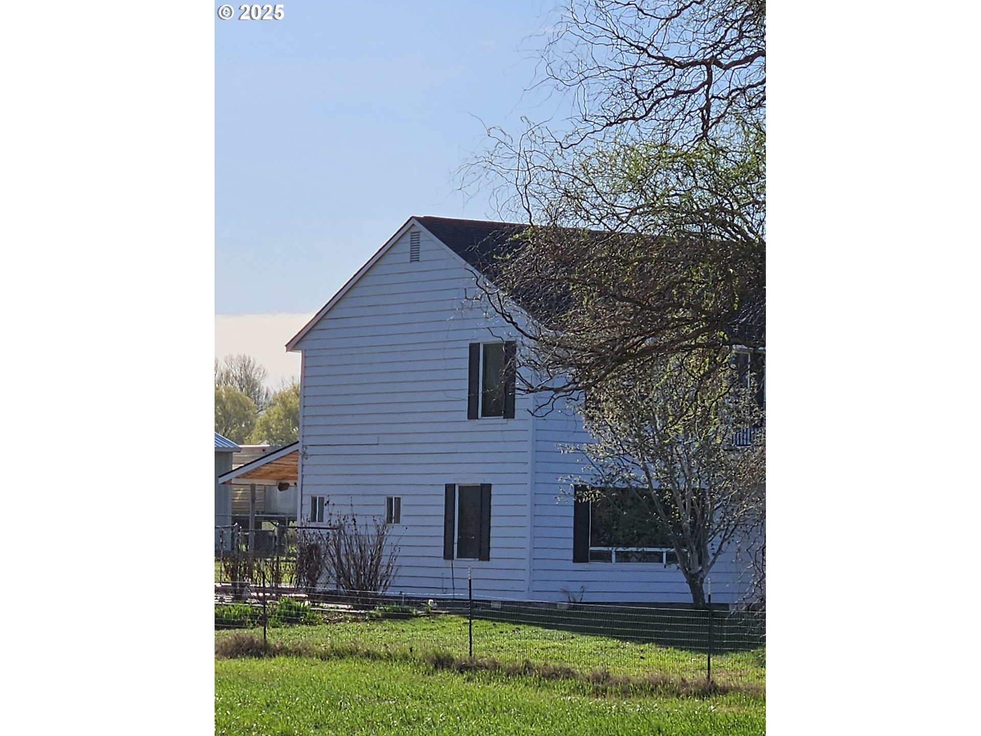 78845 Eastregaard Road Boardman, OR 97818 - Photo 22 of 27 a view of a house with a yard