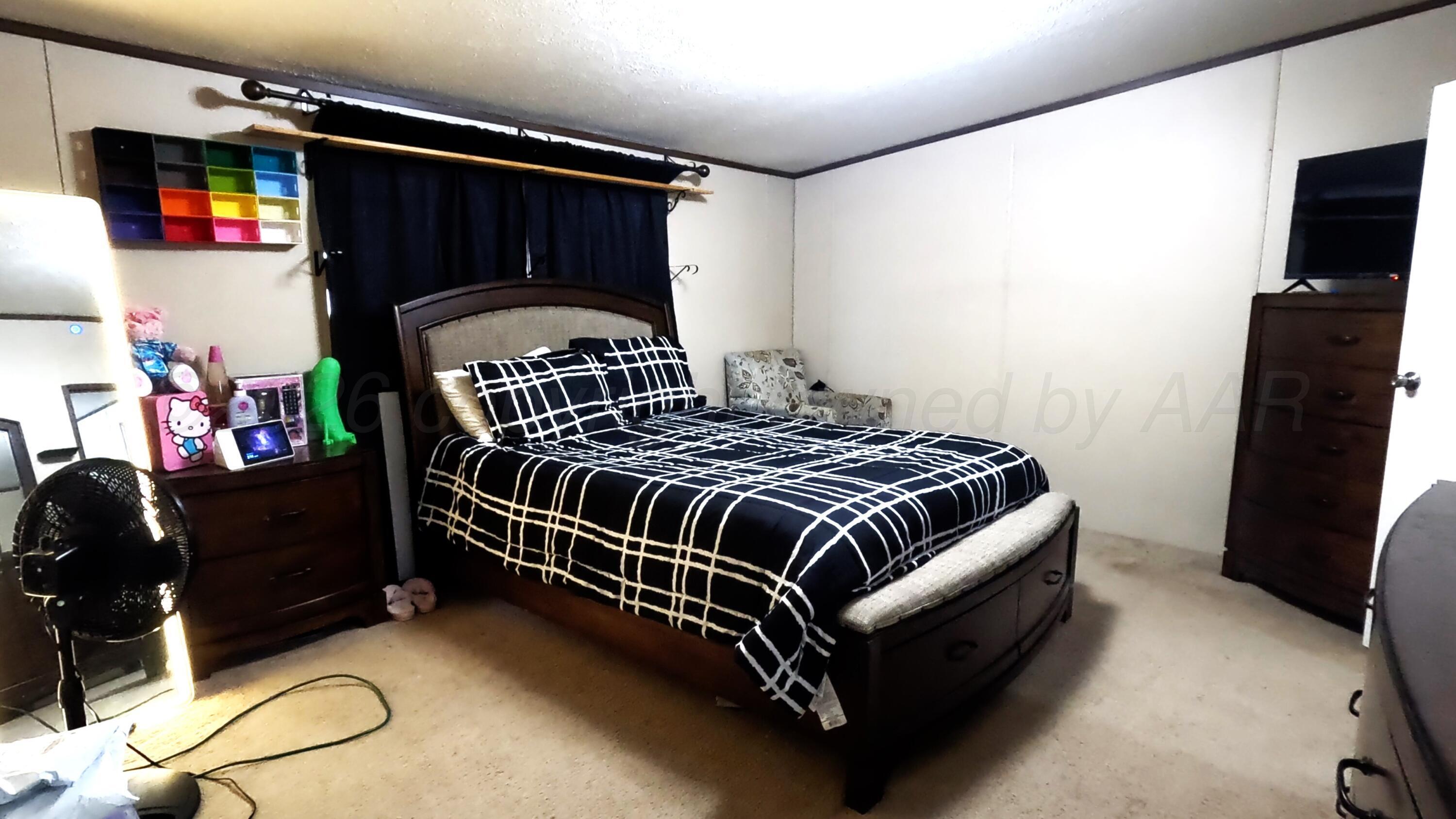 103 Bear Lane Dumas, TX 79029 - Photo 11 of 16 master bedroom