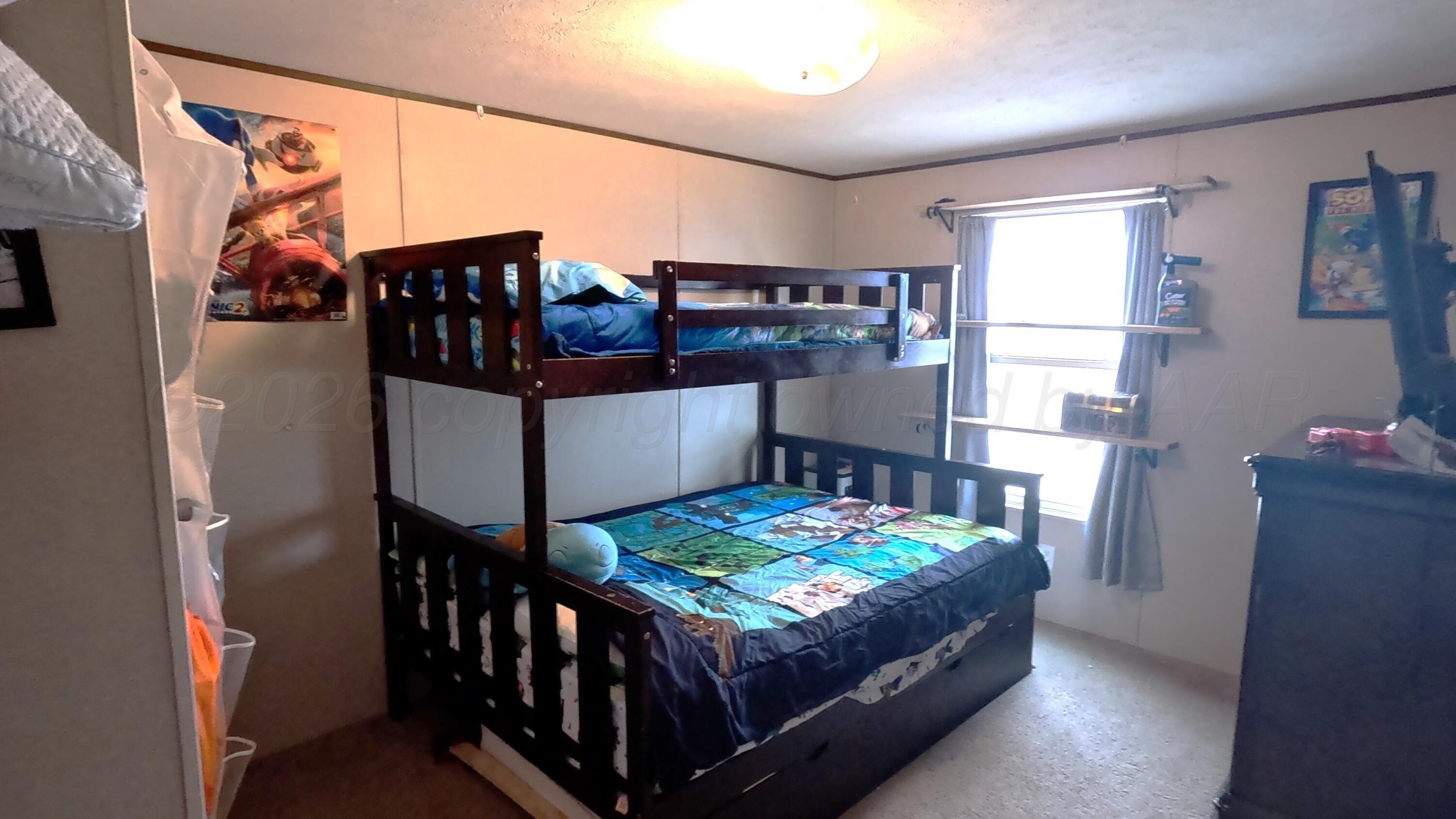 103 Bear Lane Dumas, TX 79029 - Photo 14 of 16 SW bedroom