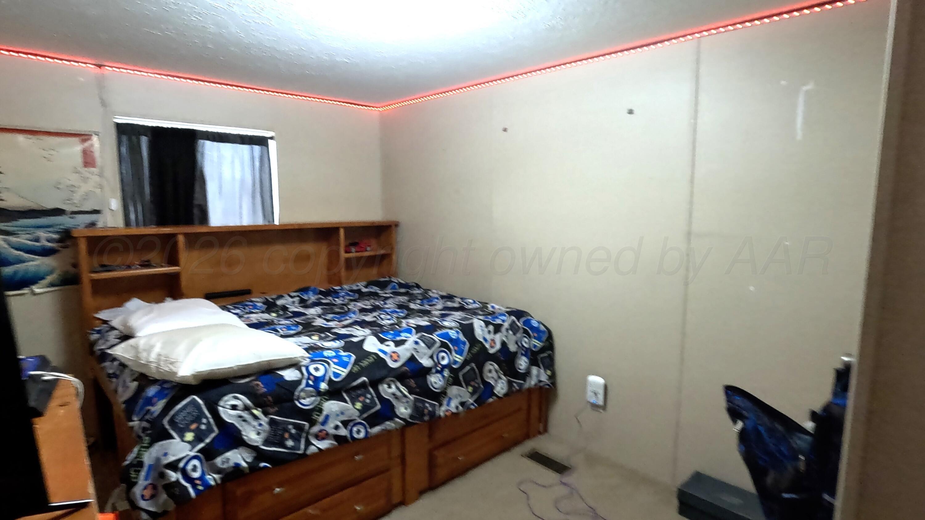 103 Bear Lane Dumas, TX 79029 - Photo 15 of 16 West bedroom