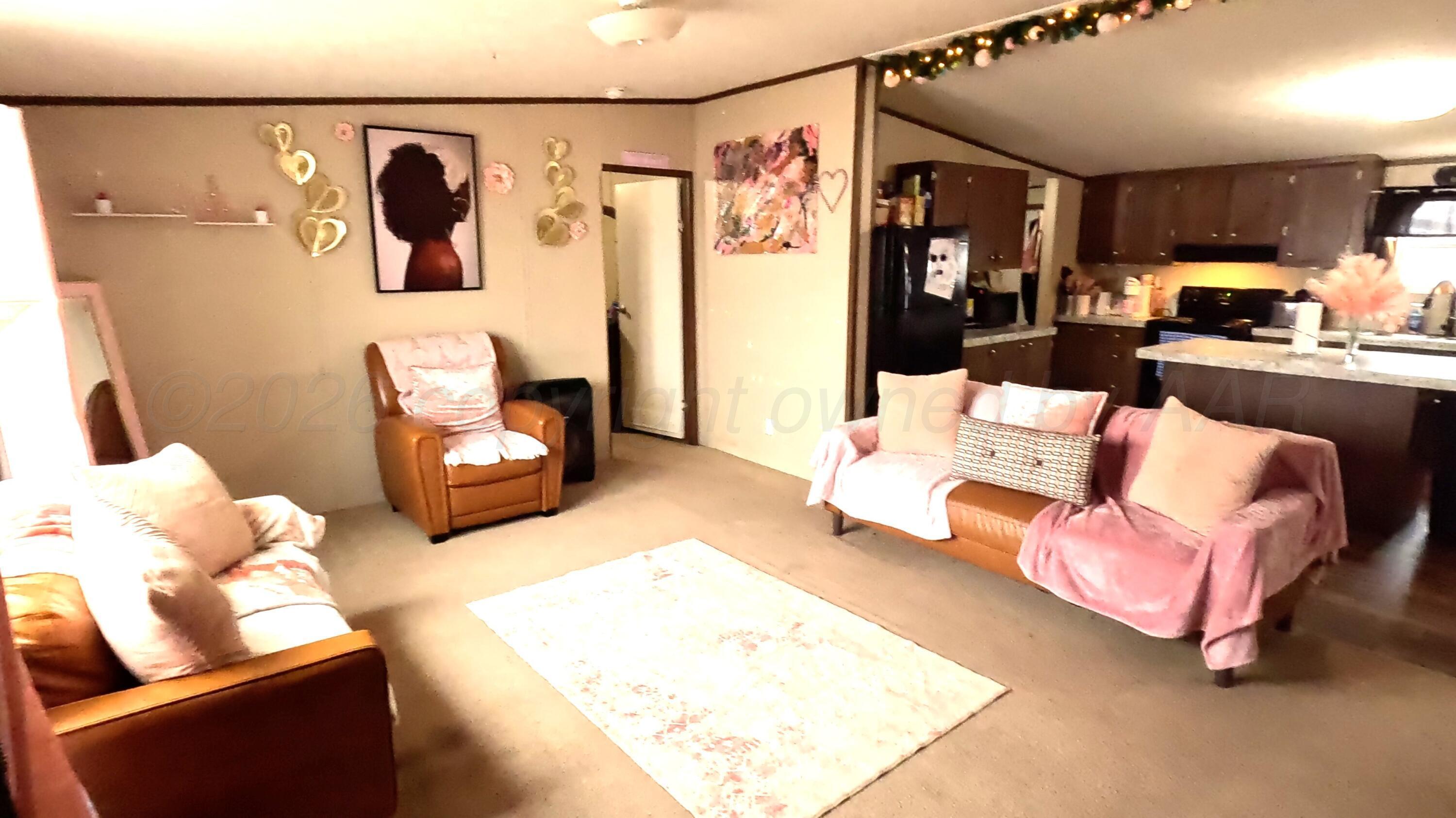 103 Bear Lane Dumas, TX 79029 - Photo 3 of 16 Living room 1