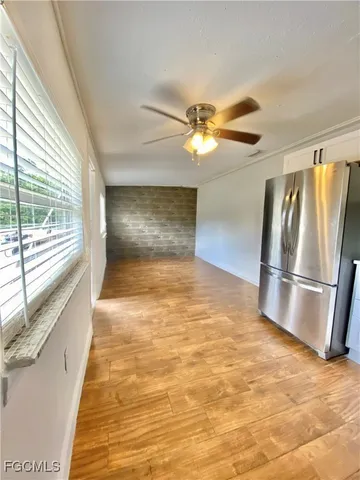 a view of a livingroom with a ceiling fan