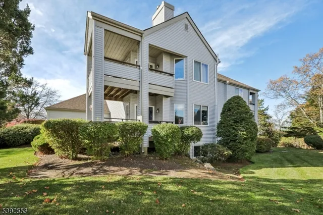 a view of a lake with a big yard