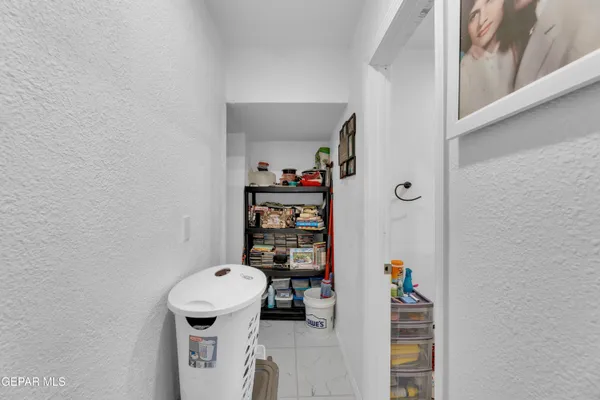 a view of a hallway with shelf